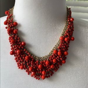 Gold statement necklace w/ red multi-size beads